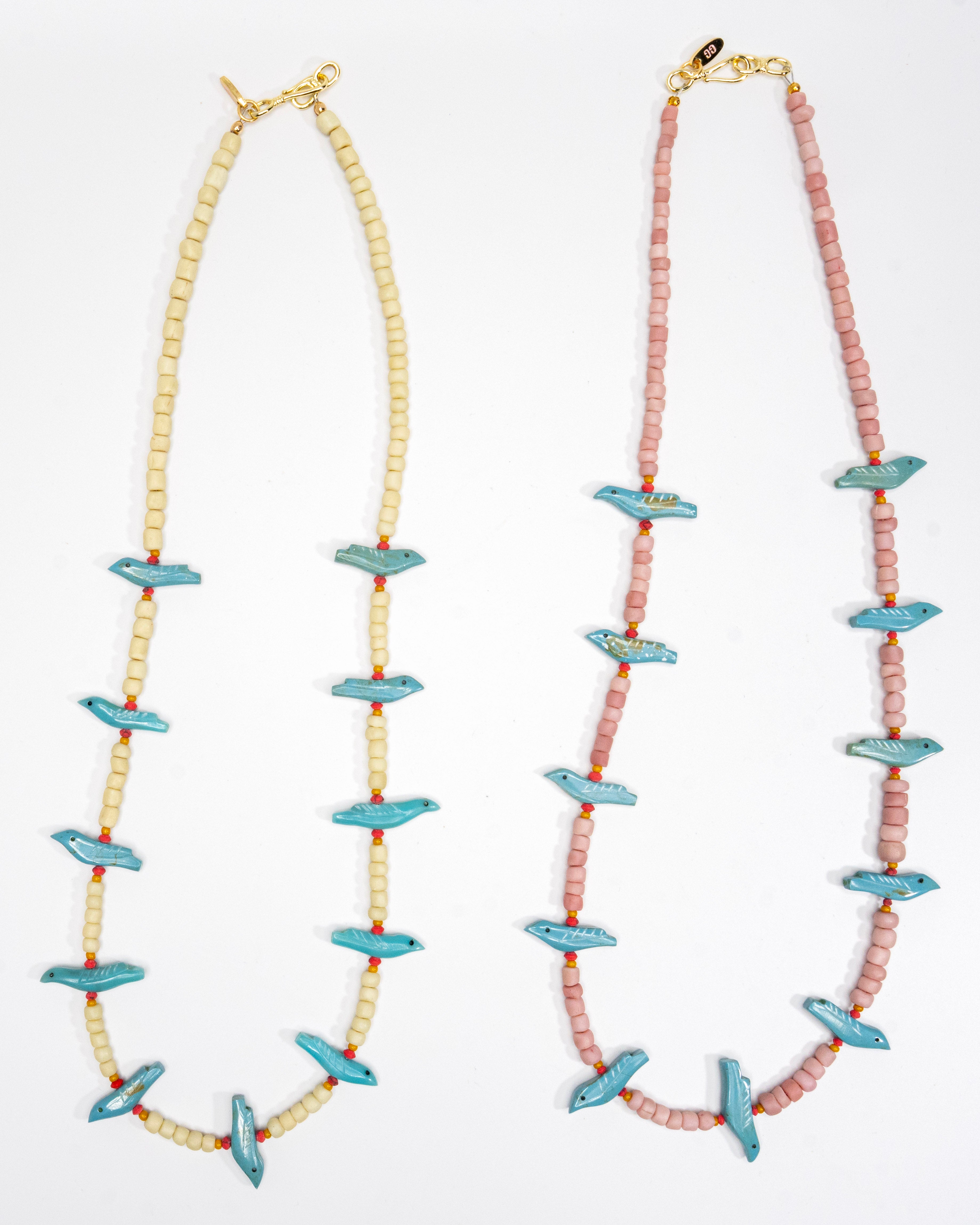 Long turquoise bird